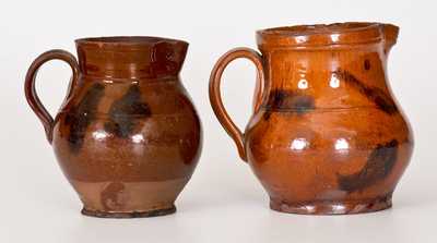 Lot of Two: Small Redware Pitchers with Manganese Decoration