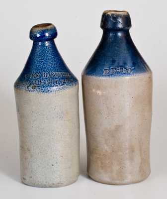 Lot of Two: Stoneware Bottles with Cobalt-Dipped Tops and Impressed Advertising