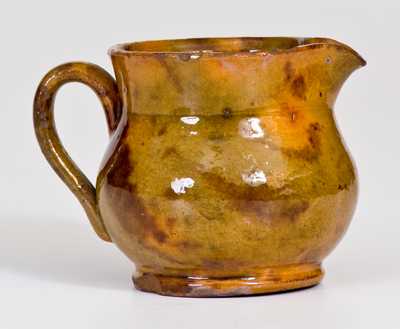 Miniature Glazed Redware Pitcher, Pennsylvania origin, second half 19th century