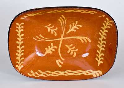 Slip-Decorated Redware Loaf Dish, PA origin, early to mid 19th century