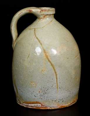 1/4 Gal. Glazed Redware Jug, probably New York State origin, circa 1840-1860