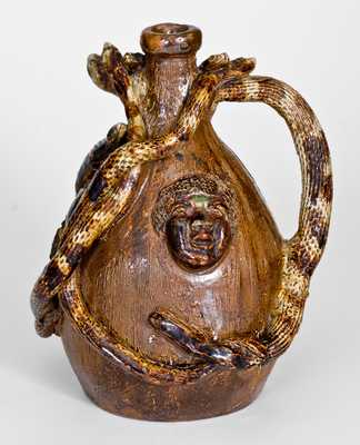 Outstanding Stoneware Temperance Jug with Applied Snakes, Animals, and Human Faces
