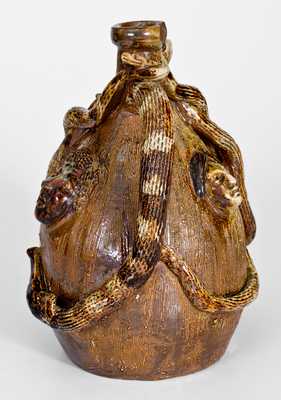Outstanding Stoneware Temperance Jug with Applied Snakes, Animals, and Human Faces