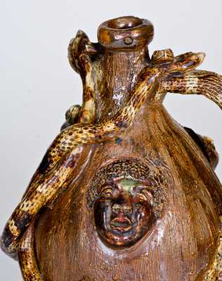 Outstanding Stoneware Temperance Jug with Applied Snakes, Animals, and Human Faces