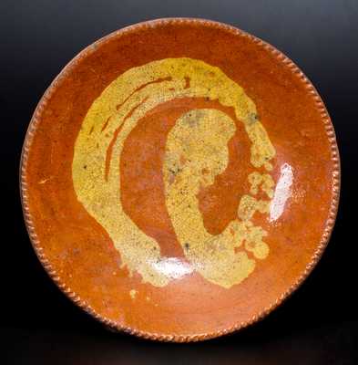 Redware Plate with Swirled Yellow Slip Decoration