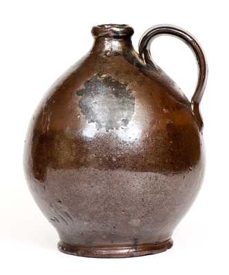 Ovoid Redware Jug with Manganese Decoration