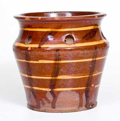 Very Unusual Redware Bulb Pot with Yellow Slip and Manganese Decoration