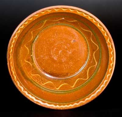 Redware Bowl with Green and Cream Slip-Decoration Interior