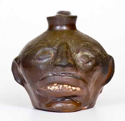 Rare Guy Daugherty, Bethune, Kershaw County, South Carolina Stoneware Face Jug, c1950