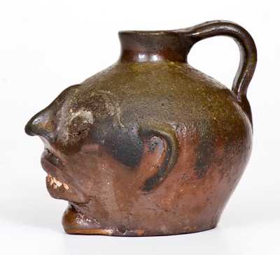 Rare Guy Daugherty, Bethune, Kershaw County, South Carolina Stoneware Face Jug, c1950