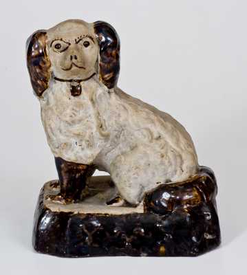 Albany-Slip-Decorated Stoneware Spaniel Doorstop, Ohio origin, fourth quarter 19th century