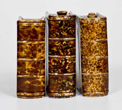 Three Flint Enamel Book Flasks, attrib. Lyman, Fenton & Co., Bennington, VT, c1849-1852