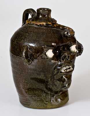 Chester Hewell, Gillsville, GA, Stoneware Face Jug w/ Applied Snake