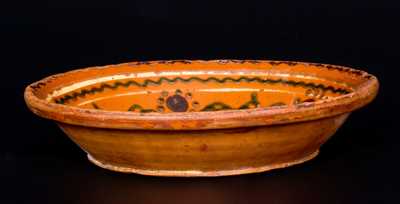 Rare Slip-Decorated Redware Plate w/ Bird Motif, possibly North Carolina, early 19th century