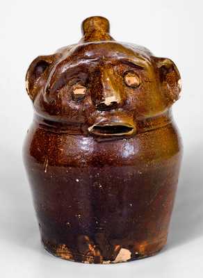 Extremely Rare Stoneware Face Harvest Jug, Alabama, fourth-quarter 19th century