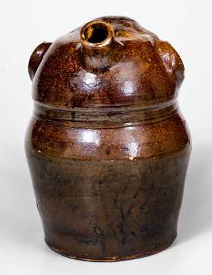 Extremely Rare Stoneware Face Harvest Jug, Alabama, fourth-quarter 19th century