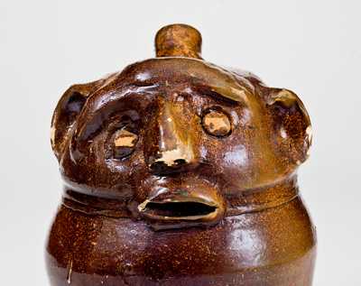 Extremely Rare Stoneware Face Harvest Jug, Alabama, fourth-quarter 19th century