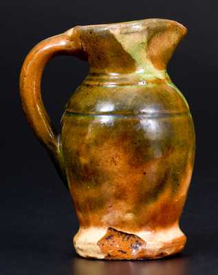 Rare Small-Sized Multi-Glazed Redware Creamer, Strasburg, VA