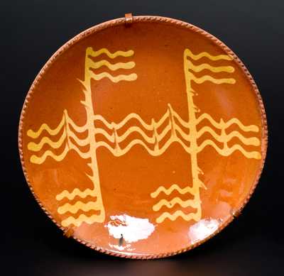 Pennsylvania Redware Plate with Yellow Slip Decoration