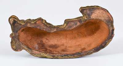 Molded Redware Reclining Dog Figure, possibly Pennsylvania