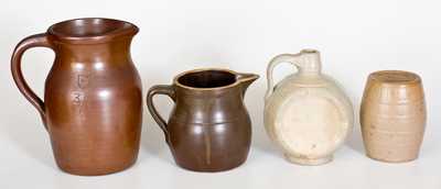 Lot of Four: Molded Stoneware incl. Dated Jug and Bank, and Two Chemical Stoneware Pitchers