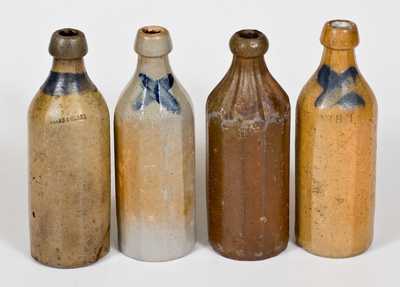 Lot of Four: Press Molded Stoneware Bottles