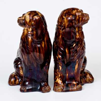 Exceptional Pair of John Bell (Waynesboro, PA) Redware Spaniel Dog Figures