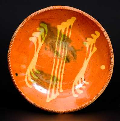 Rare Pennsylvania Redware Plate with Yellow and Green Slip Decoration