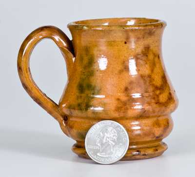 Diminutive Redware Mug with Sponged Green and Brown Decoration