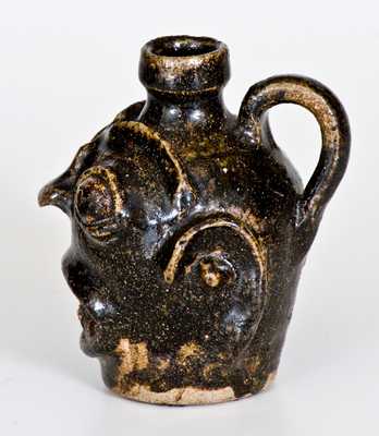 Rare and Important Diminutive Edgefield, South Carolina, Stoneware Face Jug