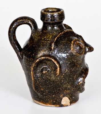 Rare and Important Diminutive Edgefield, South Carolina, Stoneware Face Jug