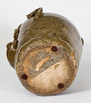 Extremely Rare and Important Edgefield, South Carolina, Stoneware Face Harvest Jug