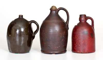 Lot of Three: Stoneware and Redware Jug Banks