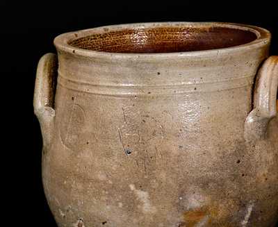 Lot of Two: 1 Gal. Stoneware Jars incl. WM. E. WARNER / WEST TROY and Jar w/ Incised Man s Head