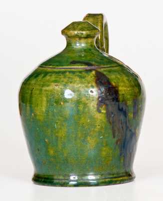 Fine Green Redware Jug Bank with Manganese Glaze