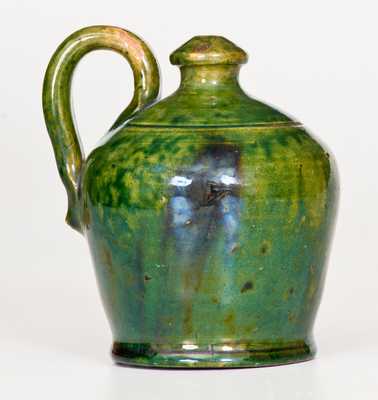 Fine Green Redware Jug Bank with Manganese Glaze