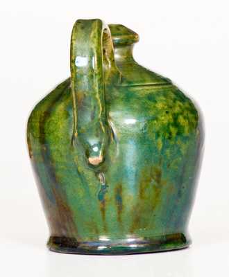 Fine Green Redware Jug Bank with Manganese Glaze