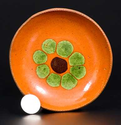Very Fine Small Redware Plate with Two-Colored Slip Flower Decoration
