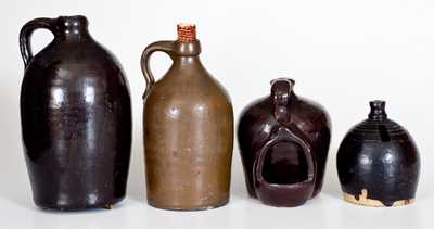 Lot of Four: Stoneware Vessels with Albany Slip Glaze incl. Chick Waterer, Bank, and Two Jugs