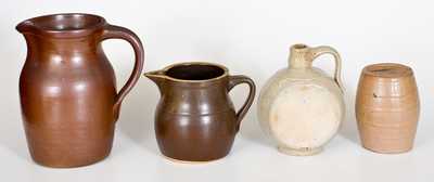 Lot of Four: Molded Stoneware incl. Dated Jug and Bank, and Two Chemical Stoneware Pitchers