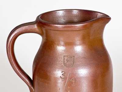 Lot of Four: Molded Stoneware incl. Dated Jug and Bank, and Two Chemical Stoneware Pitchers