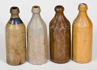 Lot of Four: Press Molded Stoneware Bottles