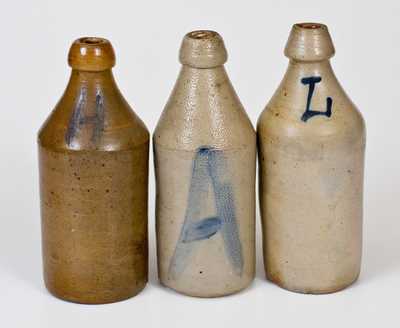 Lot of Three: Stoneware Bottles with Cobalt Letters