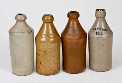 Lot of Four: Stoneware Bottles w/ Impressed Advertising incl. Two Dated Examples