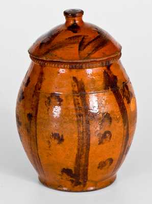 Scarce Lidded Redware Jar with Folky Decoration, probably Pennsylvania