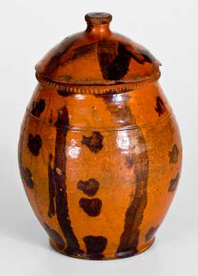 Scarce Lidded Redware Jar with Folky Decoration, probably Pennsylvania