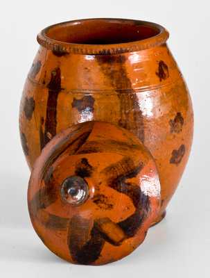 Scarce Lidded Redware Jar with Folky Decoration, probably Pennsylvania