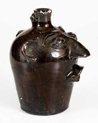 Albany-Slip-Glazed Stoneware Face Jug, Stamped
