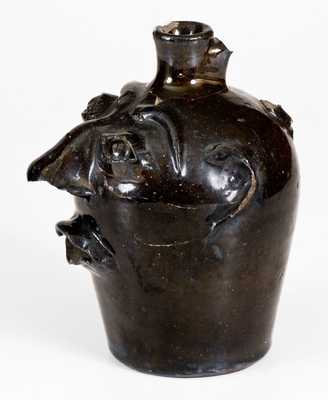 Albany-Slip-Glazed Stoneware Face Jug, Stamped 