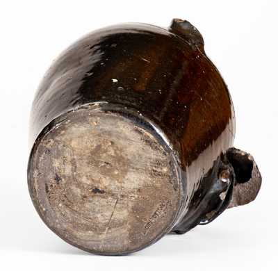 Albany-Slip-Glazed Stoneware Face Jug, Stamped